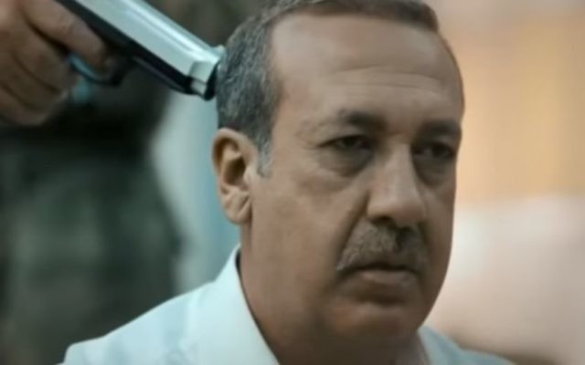 Actor playing Turkish President Recep Tayyip Erdogan about to be executed in Ali Avci's film 'Uyanis' (Awakening) in trailer released July 13, 2017. (Screen capture: YouTube) Actor playing Turkish President Recep Tayyip Erdogan about to be executed in Ali Avci's film 'Uyanis' (Awakening) in trailer released July 13, 2017. (Screen capture: YouTube)