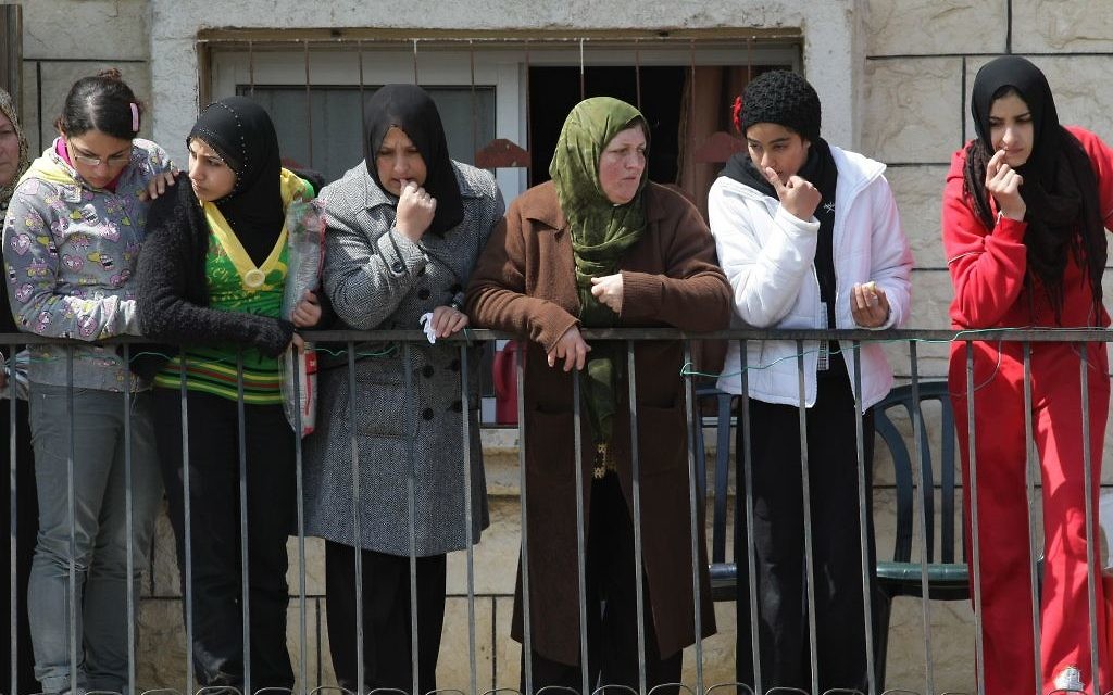 File: Arab Israeli women stand on a porch in the northern town of Umm Al-Fahm. ( Kobi Gideon/Flash90) File: Arab Israeli women stand on a porch in the northern town of Umm Al-Fahm. ( Kobi Gideon/Flash90)