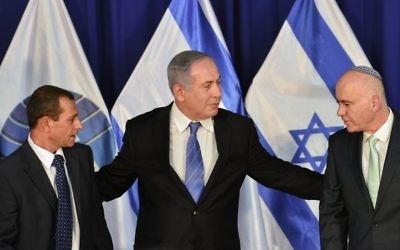 Prime Minister Benjamin Netanyahu is seen with then outgoing Shin Bet chief Yoram Cohen (R) and then head Nadav Argaman (L) at the Prime Minister's Office in Jerusalem on May 08, 2016. (Kobi Gideon/GPO)
