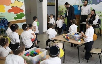 Ultra-Orthodox Jewish boys, pupils at the Poalei Menahem Talmud Torah school, in the Beitar Illit settlement on September 4, 2016. (Nati Shohat/Flash90)