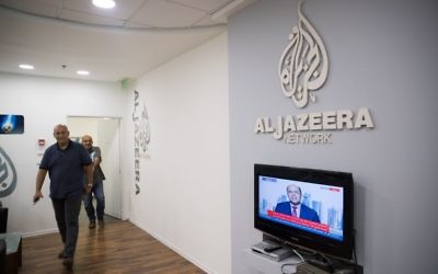 Workers at the al-Jazeera offices in Jerusalem on June 13, 2017. (Yonatan Sindel/Flash90)