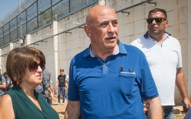 Former Arab Israeli MK Basel Ghattas enters Gilboa Prison to serve his 2-year sentence on July 2, 2017. (Basel Awidat/Flash90) Former Arab Israeli MK Basel Ghattas enters Gilboa Prison to serve his 2-year sentence on July 2, 2017. (Basel Awidat/Flash90)