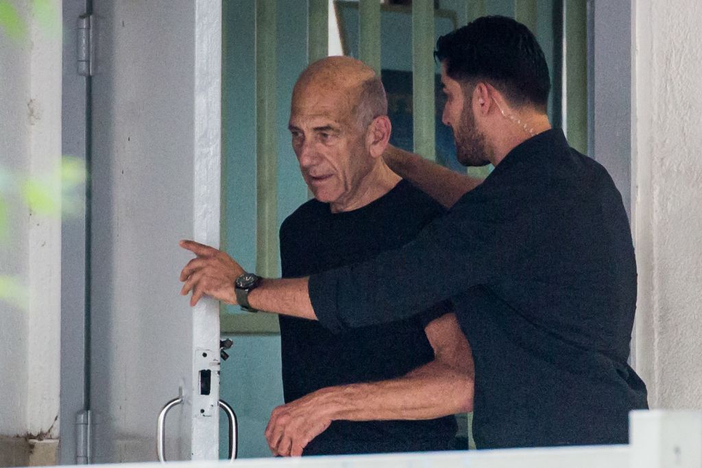 Former prime minister Ehud Olmert leaves Ramle's Ma’asiyahu prison on July 2, 2017, following his release. (Hadas Parush/Flash90) Former prime minister Ehud Olmert leaves Ramle's Ma’asiyahu prison on July 2, 2017, following his release. (Hadas Parush/Flash90)