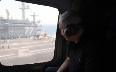Prime Minister Benjamin Netanyahu and his wife Sara visit the American aircraft carrier, 'George HW Bush," which is anchored near the Haifa coastline in Israel, July 3, 2017. (Haim Zach/GPO)