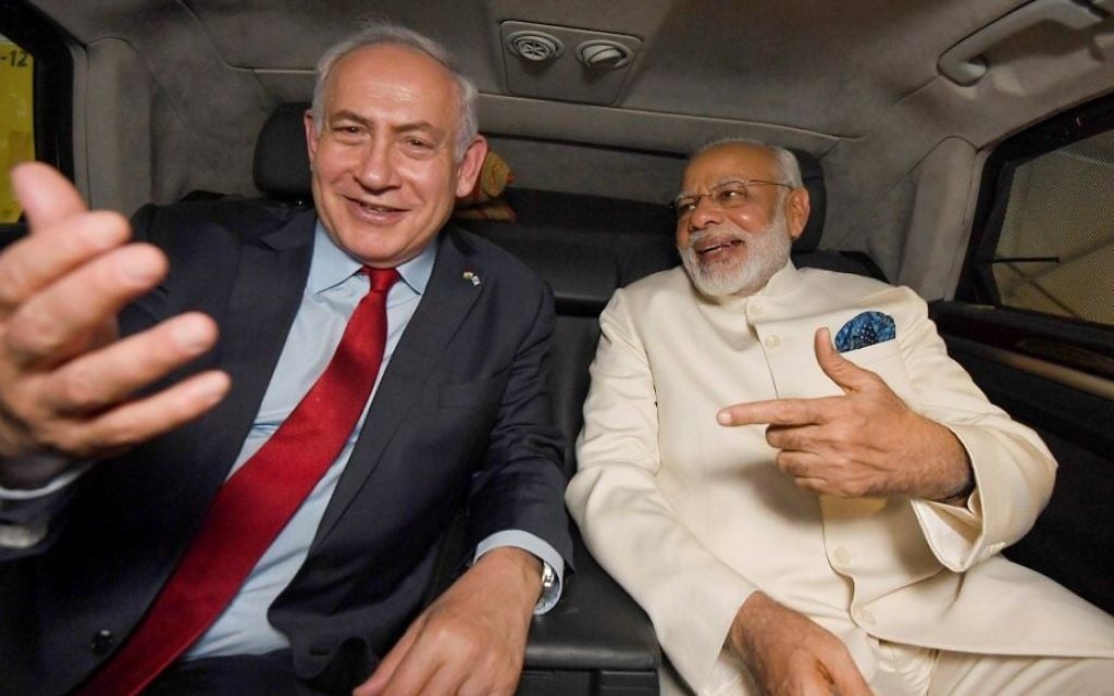 Prime Minister Benjamin Netanyahu sits in a car with his Indian counterpart Narendra Modi after the latter arrived at Ben Gurion International Airport in Tel Aviv on July 4, 2017. (Haim Zach/GPO/Flash90) Prime Minister Benjamin Netanyahu sits in a car with his Indian counterpart Narendra Modi after the latter arrived at Ben Gurion International Airport in Tel Aviv on July 4, 2017. (Haim Zach/GPO/Flash90)