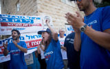 Labor party activists shout slogans outside a primary polling station in Jerusalem on July 4, 2017. (Yonatan Sindel/Flash90)