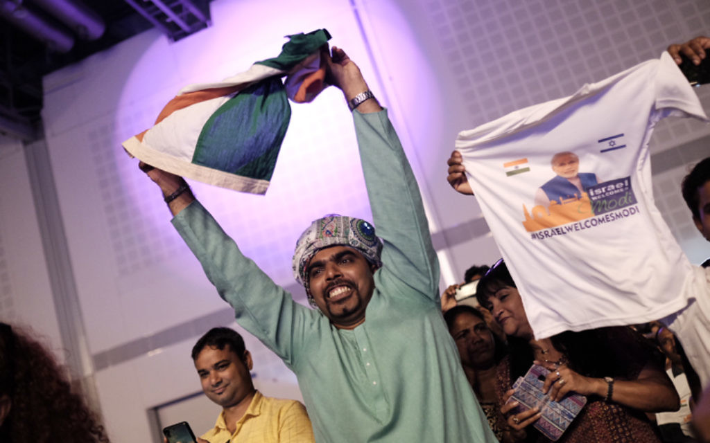 Members of the Indian community in Israel celebrate during an event marking 25 years of good relations between Israel and India during the official visit of the Indian Prime Minister Narendra Modi, at the Convention Center in Tel Aviv, on July 5, 2017. (Tomer Neuberg/Flash90)