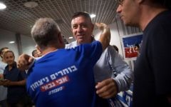 Avi Gabbay arrives to a polling station in Tel Aviv on July 10, 2017. (Miriam Alster/Flash90)