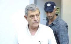 Miki Ganor is seen at a hearing at the Rishon Lezion Magistrate's Court following his arrest in the 'Case 3000' affair on July 10, 2017. (Moti Kimchi/Pool/Flash90)