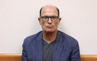 Avriel Bar-Yosef is seen at a hearing at the Rishon Lezion Magistrate's Court following his arrest in the 'Case 3000' affair on July 10, 2017. (Moti Kimchi/Pool/Flash90)