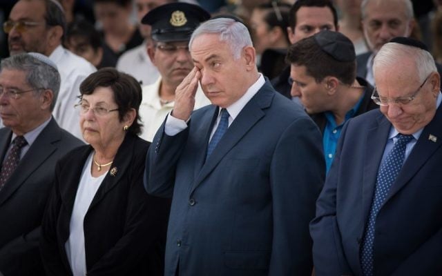 Prime Minister Benjamin Netanyahu, center, during a ceremony marking at the 74th anniversary of the death of Ze'ev Jabotinsky, on July 23, 2017. (Hadas Parush/Flash90) Prime Minister Benjamin Netanyahu, center, during a ceremony marking at the 74th anniversary of the death of Ze'ev Jabotinsky, on July 23, 2017. (Hadas Parush/Flash90)