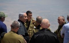Prime Minister Benjamin Netanyahu (3rd L), Defense Minister Avigdor Liberman (L) and IDF Chief of Staff Gadi Eisenkot (2nd R) tour the northern border in the Golan Heights, on July 25, 2017. (Kobi Gideon/GPO/Flash90)
