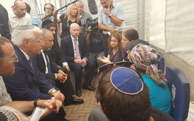 This , July 26, 2017 photo shows US ambassador to Israel David Friedman, Israeli Defense Minister Avigdor Liberman and US special envoy Jason Greenblatt at the mourners' tent in Elad, where they paid the respects to the family of Yosef Salomon (70), his daughter Haya (46) and son Elad (35) who were killed in a terror attack. (Ministry of Defense) This , July 26, 2017 photo shows US ambassador to Israel David Friedman, Israeli Defense Minister Avigdor Liberman and US special envoy Jason Greenblatt at the mourners' tent in Elad, where they paid the respects to the family of Yosef Salomon (70), his daughter Haya (46) and son Elad (35) who were killed in a terror attack. (Ministry of Defense)