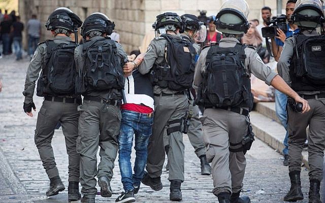 Police arrest a protester during clashes at the Old City of Jerusalem's Lions Gate on July 27, 2017. (Hadas Parush/Flash90) Police arrest a protester during clashes at the Old City of Jerusalem's Lions Gate on July 27, 2017. (Hadas Parush/Flash90)