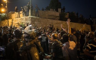 Muslim worshipers protest at at the Lion's Gate in Jerusalem's Old City, after police limited entrance to the Temple Mount to elders and women, July 27, 2017. (Hadas Parush/Flash90) Muslim worshipers protest at at the Lion's Gate in Jerusalem's Old City, after police limited entrance to the Temple Mount to elders and women, July 27, 2017. (Hadas Parush/Flash90)