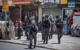 Illustrative: Police officers on patrol after Friday prayers in the East Jerusalem neighborhood of Ras al-Amud on July 28, 2017. (Hadas Parush/Flash90/File)