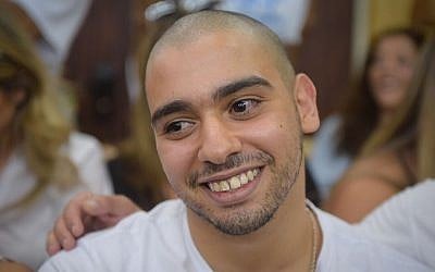 Former IDF Sgt. Elor Azaria sits in the courtroom at the Kirya military base in Tel Aviv on July 30, 2017. (Avshalom Sasoni/Pool/Flash90)