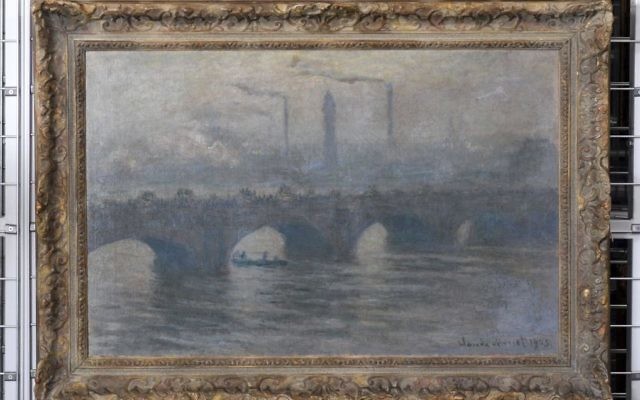 The painting 'Waterloo Bridge (1903) by Claude Monet (1840-1926) is on display during a press talk on the preparations of an exhibition of exemplary works from the art collection of Cornelius Gurlitt discovered in 2012, in November in Bonn, Germany, Tuesday June, 27, 2017. (Henning Kaiser/dpa via AP)