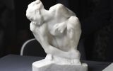 The sculpture 'Kauernde' (lit. 'Cowering') by Auguste Rodin (1840-1917) is on display during a press talk on the preparations of an exhibition of exemplary works from the art collection of Cornelius Gurlitt discovered in 2012, in November in Bonn, Germany, Tuesday June, 27, 2017. (Henning Kaiser/dpa via AP)