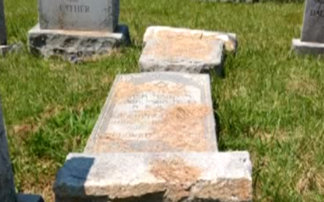 A toppled headstone found in a Jewish cemetery in Hartford, Connecticut, on July 21, 2017. (Screen capture: YouTube) A toppled headstone found in a Jewish cemetery in Hartford, Connecticut, on July 21, 2017. (Screen capture: YouTube)