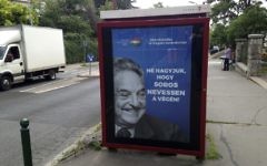 An anti-Soros poster reading '99 percent reject illegal migration' and 'Let’s not allow Soros to have the last laugh,' in Budapest, Hungary, on July 5, 2017. (AP/Pablo Gorondi)