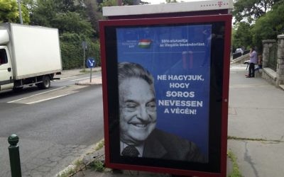 This photo taken on July 5, 2017 in Budapest, shows an anti-Soros campaign reading "99 percent reject illegal migration" and “Let’s not allow Soros to have the last laugh”. (AP Photo/Pablo Gorondi)