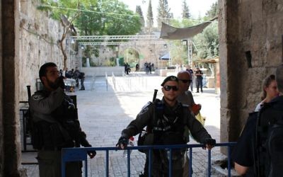 Border policeman stand guard outside the Lions Gate of the Old City in Jerusalem, July 25, 2017. (Raoul Wootliff/Times of Israel)