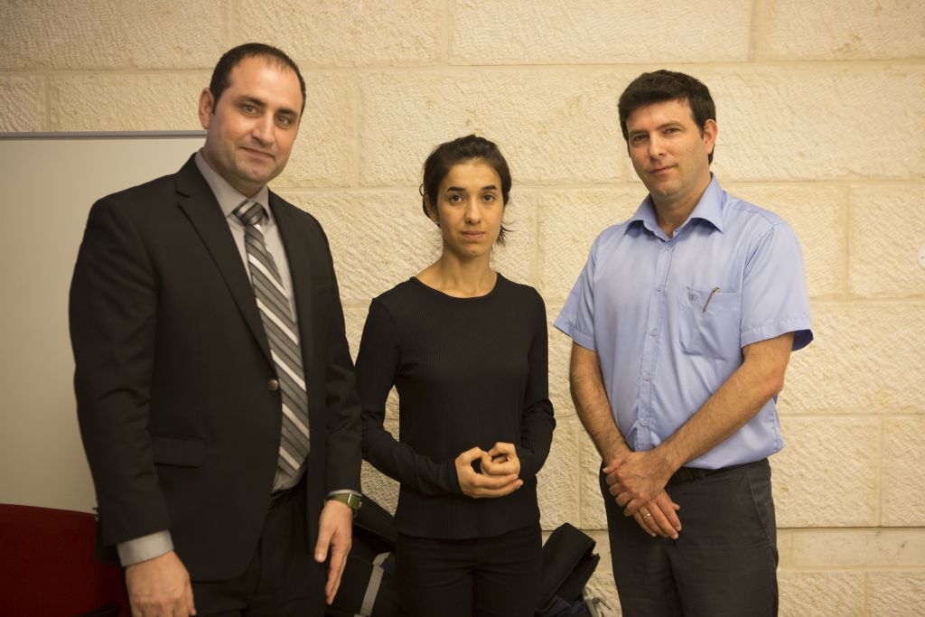 IYazidi activists Haider Elias, Nadia Murad, with Dr. Eyal Kaminka, director of the International School of Holocaust Studies at Yad Vashem. (courtesy/IsraAID) Yazidi activists Haider Elias, Nadia Murad, with Dr. Eyal Kaminka, director of the International School of Holocaust Studies at Yad Vashem. (courtesy/IsraAID)