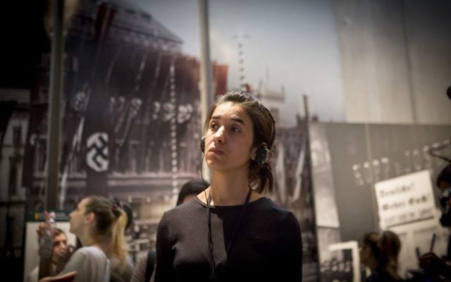 Nadia Murad, a Yazidi woman who escaped Islamic State captivity, tours Yad Vashem in Jerusalem on July 24, 2017 (Mickey Noam-Alon/IsraAID)
