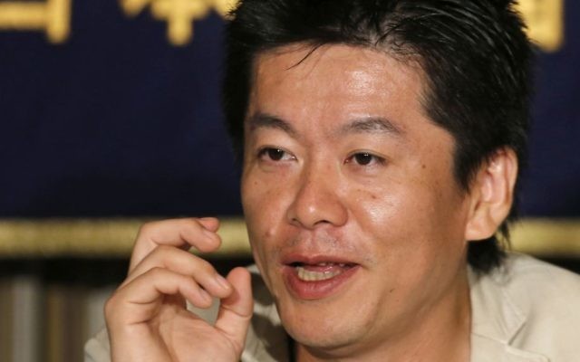 Takafumi Horie, the Japanese dot.com celebrity speaks during a press conference at the Foreign Correspondents' Club of Japan in Tokyo, June 5, 2013. (AP/Shuji Kajiyama) Takafumi Horie, the Japanese dot.com celebrity speaks during a press conference at the Foreign Correspondents' Club of Japan in Tokyo, June 5, 2013. (AP/Shuji Kajiyama)