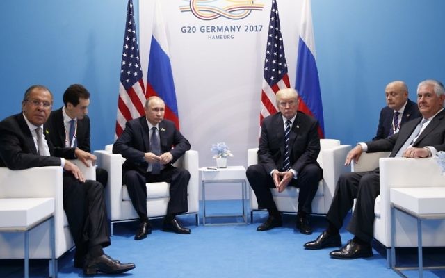 In this Friday, July 7, 2017, file photo, US President Donald Trump meets with Russian President Vladimir Putin at the G20 Summit, in Hamburg. Russian Foreign Minister Sergey Lavrov is at left, Secretary of State Rex Tillerson is at right. (AP Photo/Evan Vucci) In this Friday, July 7, 2017, file photo, US President Donald Trump meets with Russian President Vladimir Putin at the G20 Summit, in Hamburg. Russian Foreign Minister Sergey Lavrov is at left, Secretary of State Rex Tillerson is at right. (AP Photo/Evan Vucci)