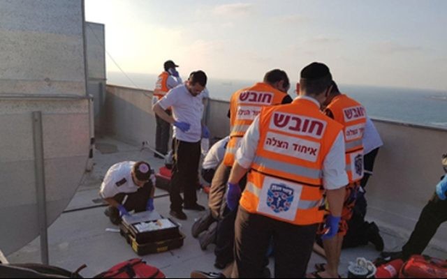 Scene where a 16-year-old was electrocuted to death in Exodus Street, Ashdod, July 9, 2017. (Magen David Adom) Scene where a 16-year-old was electrocuted to death in Exodus Street, Ashdod, July 9, 2017. (Magen David Adom)