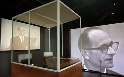 The bulletproof glass booth in which Adolf Eichmann testified during his trial in Jerusalem District Court is displayed in the "Operation Finale: The Capture & Trial of Adolf Eichmann" exhibit at the Museum of Jewish Heritage, in New York, Friday, July 14, 2017. (AP Photo/Richard Drew)
