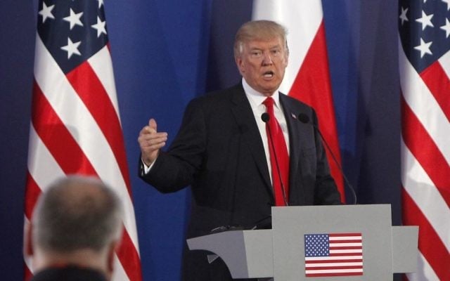 US President Donald Trump gestures while answering a question during a joint press conference with Poland's President Andrzej Duda, in Warsaw, Poland, Thursday, July 6, 2017. (AP Photo/Czarek Sokolowski) US President Donald Trump gestures while answering a question during a joint press conference with Poland's President Andrzej Duda, in Warsaw, Poland, Thursday, July 6, 2017. (AP Photo/Czarek Sokolowski)