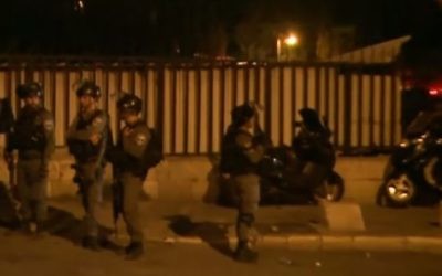 Screen capture from video showing border police seen during clashes with protesters in East Jerusalem overnight July 17, 2017. (YouTube/Ruptly TV)