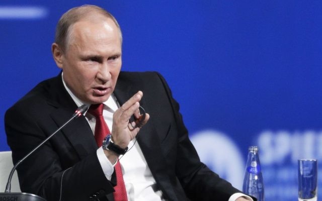 In this June 2, 2017 file photo, Russian President Vladimir Putin speaks in St. Petersburg, Russia. (AP Photo/Dmitry Lovetsky, File) In this June 2, 2017 file photo, Russian President Vladimir Putin speaks in St. Petersburg, Russia. (AP Photo/Dmitry Lovetsky, File)