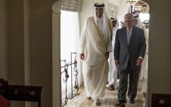 The Emir of Qatar, Sheikh Tamim Bin Hamad Al Thani, left, welcomes US Secretary of State Rex Tillerson to Sea Palace, his official residence, in Doha, Qatar, Tuesday, July 11, 2017. (Alexander W. Riedel/US State Department via AP)