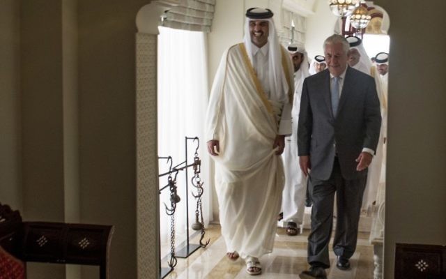 The Emir of Qatar, Sheikh Tamim Bin Hamad Al Thani, left, welcomes US Secretary of State Rex Tillerson to Sea Palace, his official residence, in Doha, Qatar, Tuesday, July 11, 2017. (Alexander W. Riedel/US State Department via AP) The Emir of Qatar, Sheikh Tamim Bin Hamad Al Thani, left, welcomes US Secretary of State Rex Tillerson to Sea Palace, his official residence, in Doha, Qatar, Tuesday, July 11, 2017. (Alexander W. Riedel/US State Department via AP)