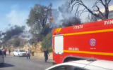 Illustrative: Firefighters battle a fire in the northern city of Safed on July 16, 2017. (Screen capture: YouTube)