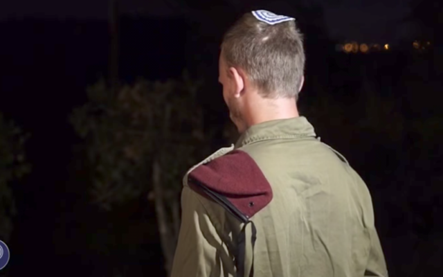 Sgt. Ayin, who shot and injured a terrorist who killed three Israelis at the Halamish settlement on July 21 (IDF Spokesperson's Unit) Sgt. Ayin, who shot and injured a terrorist who killed three Israelis at the Halamish settlement on July 21 (IDF Spokesperson's Unit)