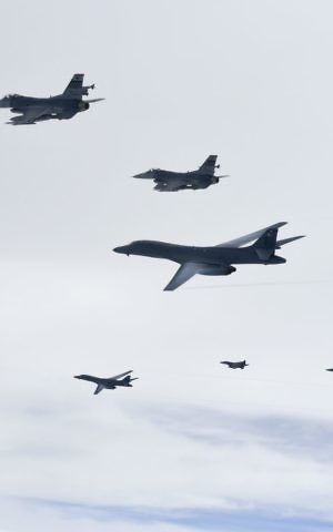 In this photo provided by South Korea Defense Ministry, US Air Force B-1B Lancer bombers, bottom left and third from top, fly with South Korean and US fighter jets over the Korean Peninsula, South Korea Saturday, July 8, 2017. (South Korea Defense Ministry via AP) In this photo provided by South Korea Defense Ministry, US Air Force B-1B Lancer bombers, bottom left and third from top, fly with South Korean and US fighter jets over the Korean Peninsula, South Korea Saturday, July 8, 2017. (South Korea Defense Ministry via AP)