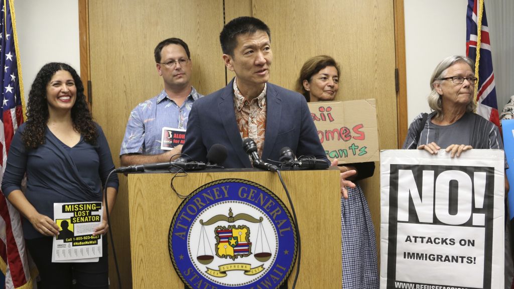 In this June 30, 2017, photo, Hawaii Attorney General Douglas Chin speaks at a news conference about President Donald Donald Trump's travel ban in Honolulu. (AP Photo/Caleb Jones) In this June 30, 2017, photo, Hawaii Attorney General Douglas Chin speaks at a news conference about President Donald Donald Trump's travel ban in Honolulu. (AP Photo/Caleb Jones)