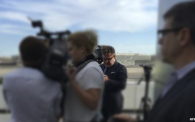 In this photo provided by Radio Free Europe/Radio Liberty, Rinat Akhmetshin is photographed at the Newseum in Washington, June 13, 2016 after a documentary screening. (Radio Free Europe/Radio Liberty via AP) In this photo provided by Radio Free Europe/Radio Liberty, Rinat Akhmetshin is photographed at the Newseum in Washington, June 13, 2016 after a documentary screening. (Radio Free Europe/Radio Liberty via AP)