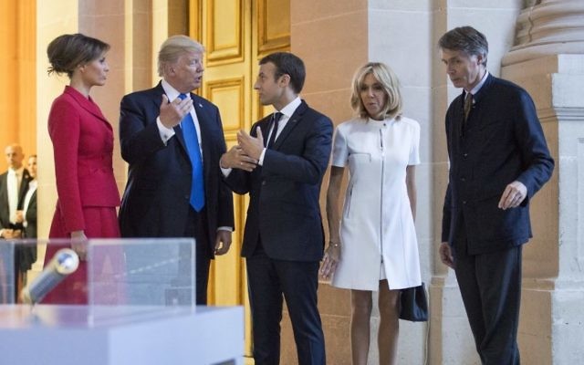President Donald Trump, first lady Melania Trump, French President Emmanuel Macron his wife Brigitte Macron, tour Marechal Foch's Tomb with David Guillet, director of the Army Museum, at Les Invalides in Paris, Thursday, July 13, 2017. (AP Photo/Carolyn Kaster, Pool) President Donald Trump, first lady Melania Trump, French President Emmanuel Macron his wife Brigitte Macron, tour Marechal Foch's Tomb with David Guillet, director of the Army Museum, at Les Invalides in Paris, Thursday, July 13, 2017. (AP Photo/Carolyn Kaster, Pool)