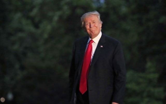 President Donald Trump smiles as he walks on the South Lawn upon arrival the White House in Washington, Saturday, July 8, 2017, from the G20 Summit in Hamburg, Germany. (AP/Manuel Balce Ceneta) President Donald Trump smiles as he walks on the South Lawn upon arrival the White House in Washington, Saturday, July 8, 2017, from the G20 Summit in Hamburg, Germany. (AP/Manuel Balce Ceneta)