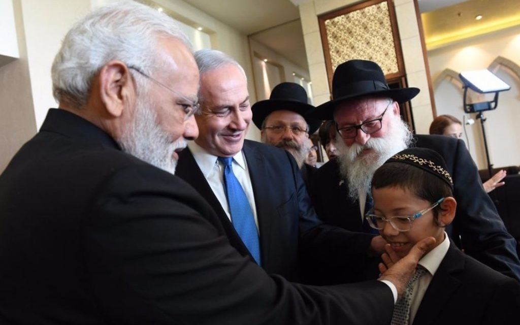 Indian Prime Minister Narendra Modi on July 5, 2017 meets with Moshe Holtzberg, the now 12-year-old son of two Chabad emissaries who were killed in a 2008 terror attack in Mumbai. (Haim Tzach, GPO)