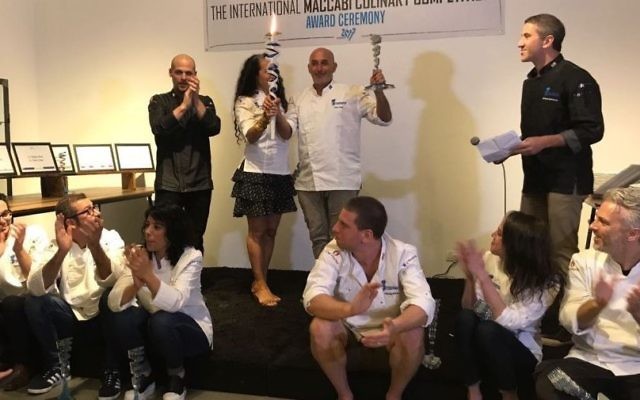 The gold medal-winning team for the culinary competition: Standing, L-R is Team Australia, Ido Zarmi, Ronit Robbaz, Zohar Flantz, Michael Solomonov. Sitting L-R is Team Israel: Osama Dalal, Shalom Ghenesh and Lamees Salem and Team USA: Yehuda Sichel, Lissadel Cohen Serrins and Lior Lev Sercarz. (Courtesy Sara Weinstein) The gold medal-winning team for the culinary competition: Standing, L-R is Team Australia, Ido Zarmi, Ronit Robbaz, Zohar Flantz, Michael Solomonov. Sitting L-R is Team Israel: Osama Dalal, Shalom Ghenesh and Lamees Salem and Team USA: Yehuda Sichel, Lissadel Cohen Serrins and Lior Lev Sercarz. (Courtesy Sara Weinstein)