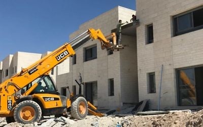 A photograph of the construction work being done for a new neighborhood in the Ma'ale Amos settlement on June 18, 2017. (Jacob Magid/Times of Israel)