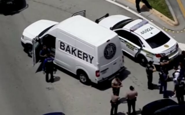 An abandoned van used in a bank robbery that belongs to the Kosher Miami bakery Zak the Baker. (Screen capture: YouTube)