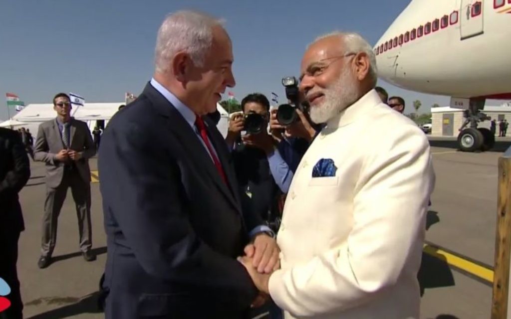 Prime Minister Benjamin Netanyahu, left, and Indian Premier Narendra Modi at Ben Gurion Airport on July 4, 2017. (screen capture: GPO)